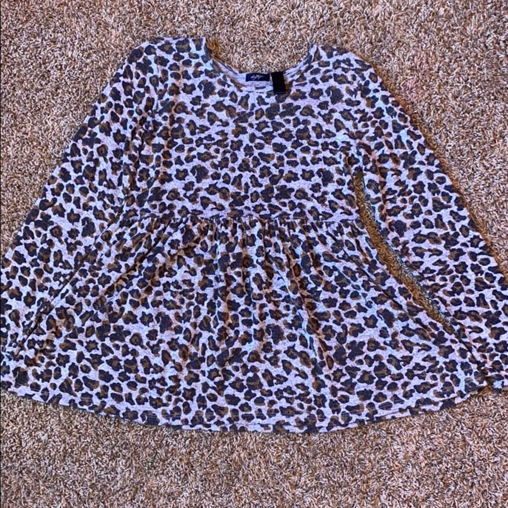 A long sleeve flowy shirt from The Buckle.
